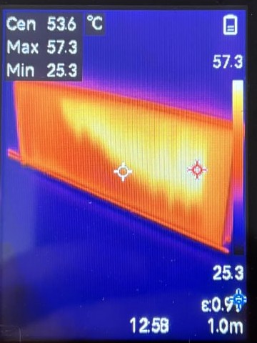 Thermal camera frame at 12:58 showing the same radiator hot across the whole panel, centre 53.6C